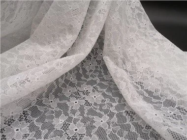 Elastischer Spitzenstoff der niedlichen Kinderkleidung